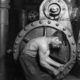 Lewis Hine, Power House Mechanic working on steam, 1920
